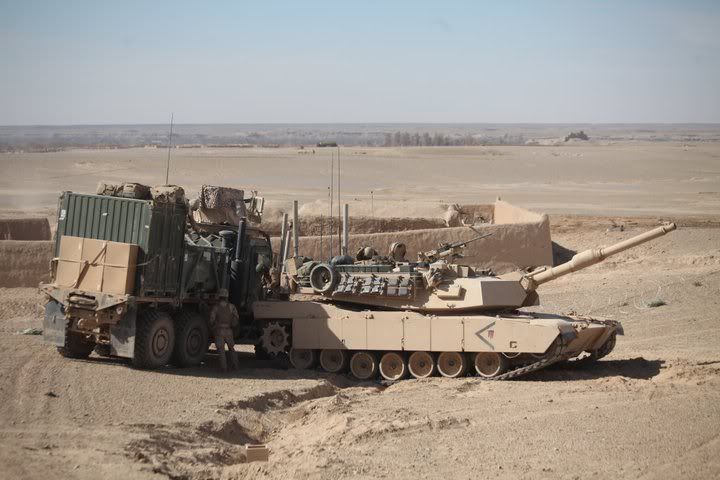 http://i72.photobucket.com/albums/i172/ShaneGowan/Models%20wrecker%20Bronco%20humvee/m1a1hc.jpg